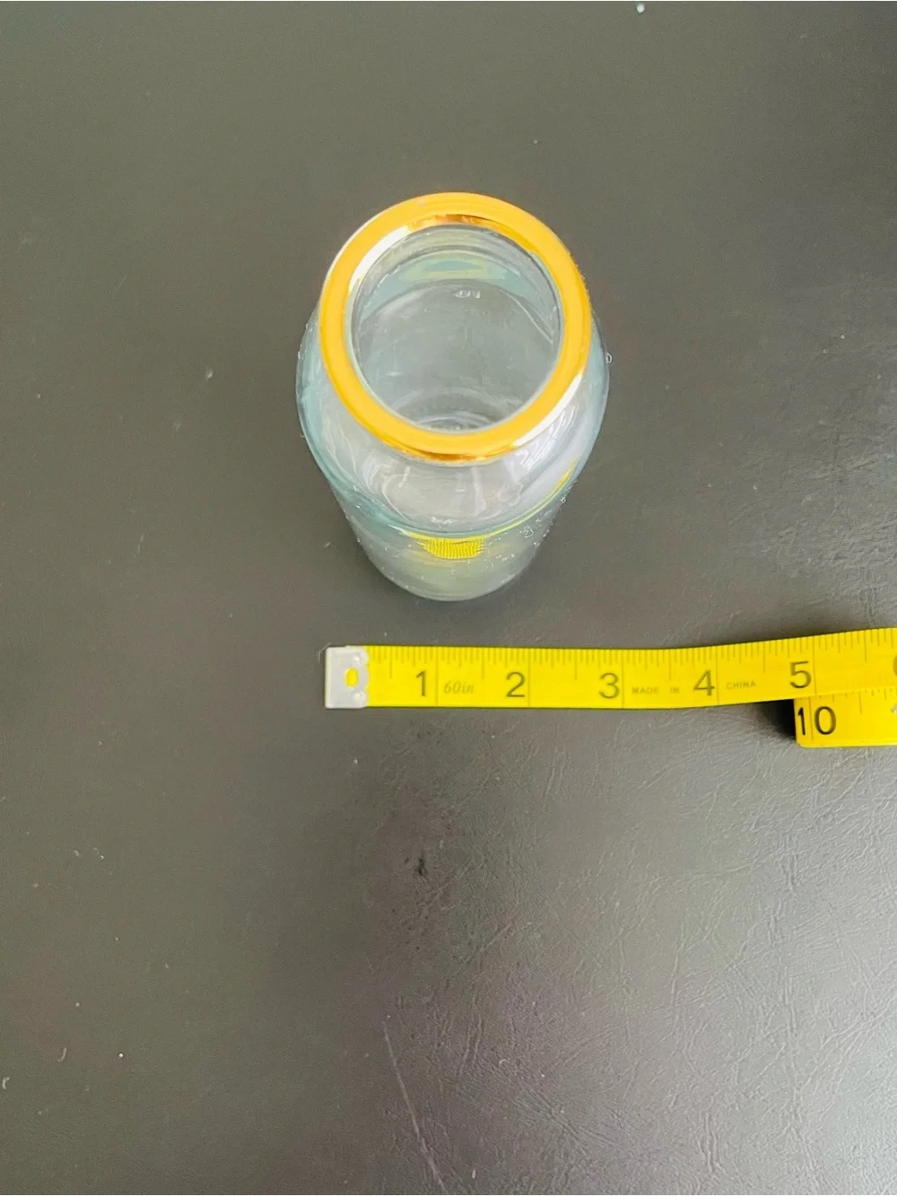 Clear Glass Bottle with Gold Rim